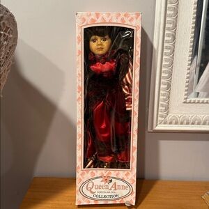 Vintage Queen Anne Porcelain Doll in Red Dress. Collectors piece.